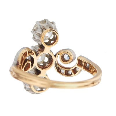 Lot 27 - An Art Nouveau 18ct gold diamond three-stone...