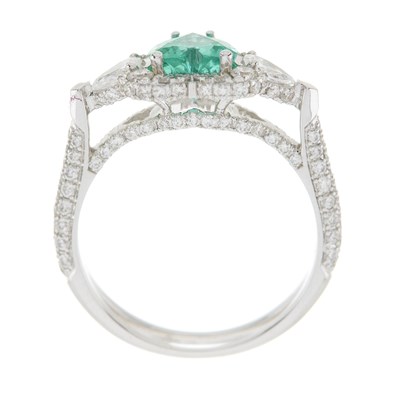 Lot 57 - An 18ct gold emerald and diamond cluster dress ring