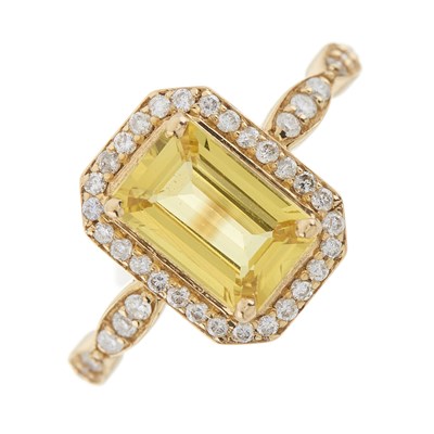 Lot 262 - A 14ct gold citrine and brilliant-cut diamond cluster dress ring