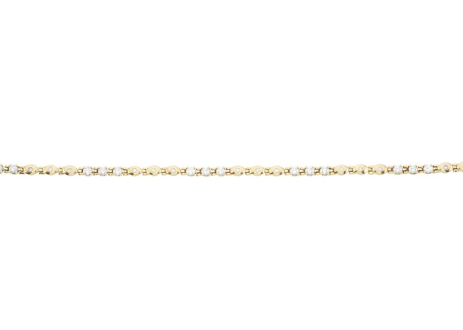 Lot 59 - An 18ct gold diamond line bracelet