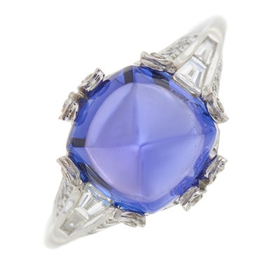 Lot 234 - An 18ct gold sugarloaf tanzanite and diamond dress ring