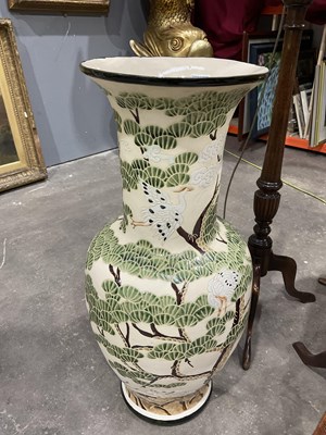 Lot 379 - A floor-standing oriental baluster vase, 20th...