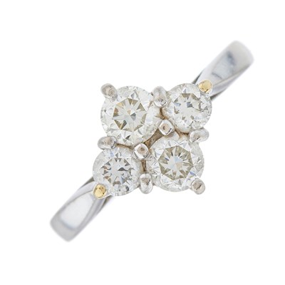 Lot 50 - An 18ct gold diamond four-stone cluster ring,...