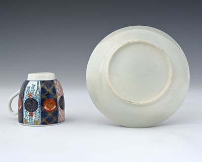 Lot 669 - A Worcester polychrome coffee cup and saucer,...