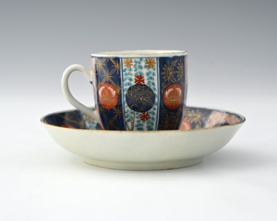 Lot 669 - A Worcester polychrome coffee cup and saucer,...