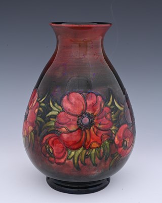 Lot 638 - Walter Moorcroft, a large flambe Anemone...