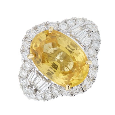 Lot 56 - An 18ct gold yellow sapphire and diamond...