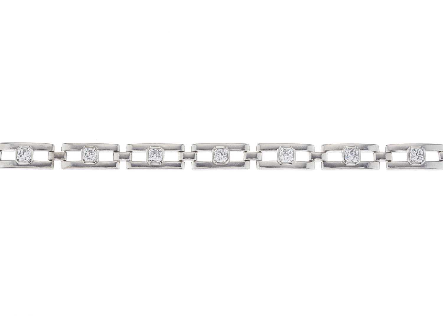 Lot 57 - An 18ct gold square-shape diamond line...