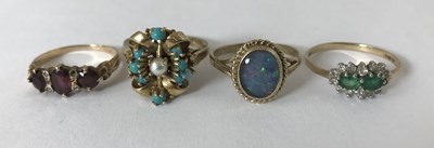 Lot 282 - Four 9ct gold gem-set rings