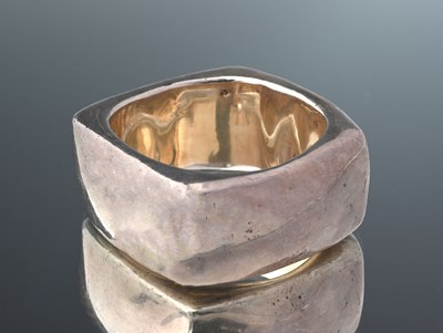 Lot 60 - A silver square bangle bracelet