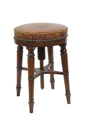 Lot 389 - A 19th Century mahogany piano stool, revolving...