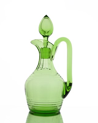 Lot 506 - Stuart and Sons, an Art Deco green glass...