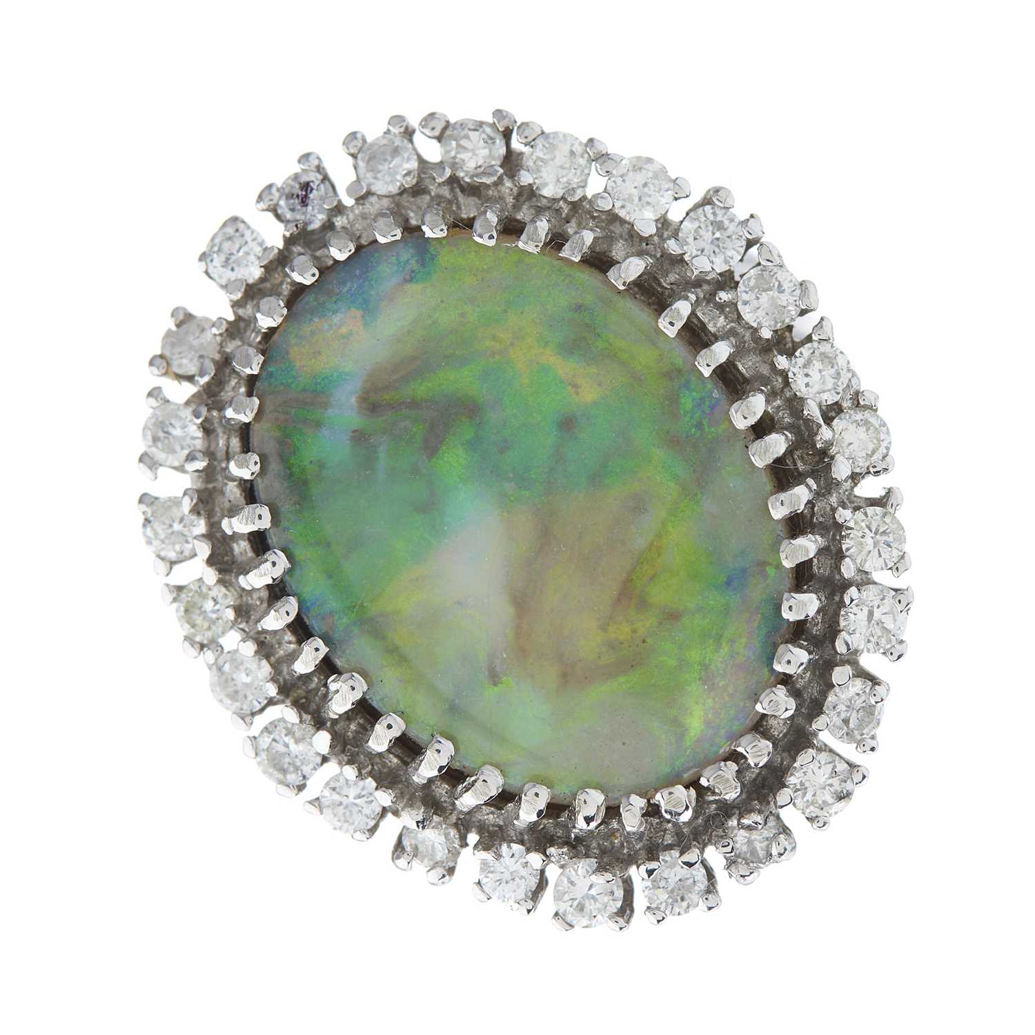 Lot 85 - A mid 20th century oval opal cabochon and...