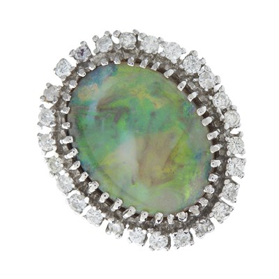 Lot 85 - A mid 20th century oval opal cabochon and...