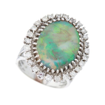 Lot 85 - A mid 20th century oval opal cabochon and...