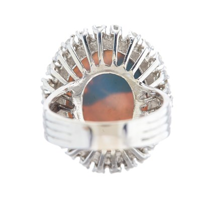 Lot 85 - A mid 20th century oval opal cabochon and...