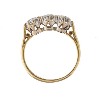 Lot 99 - An 18ct gold brilliant-cut diamond three-stone...