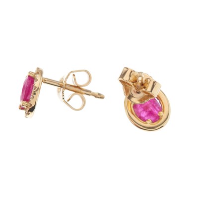 Lot 112 - A pair of 18ct gold oval-shape ruby and...
