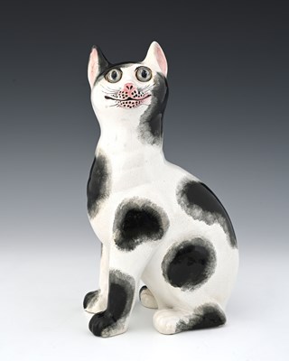 Lot 659 - A large Wemyss Ware cat, circa 1900, seated...