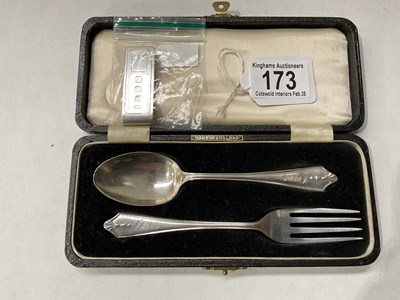 Lot 173 - A silver teaspoon and cake fork in fitted case...