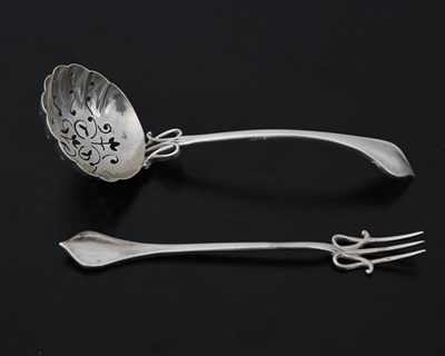 Lot 100 - An Arts and Crafts silver pickle fork and...