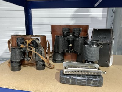 Lot 201 - A Sigma Skylight 52mm zoom lens, cased, with...