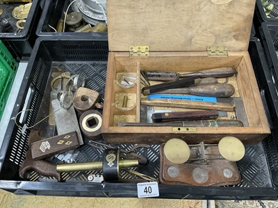 Lot 40 - A toolbox containing 19th and early 20th...