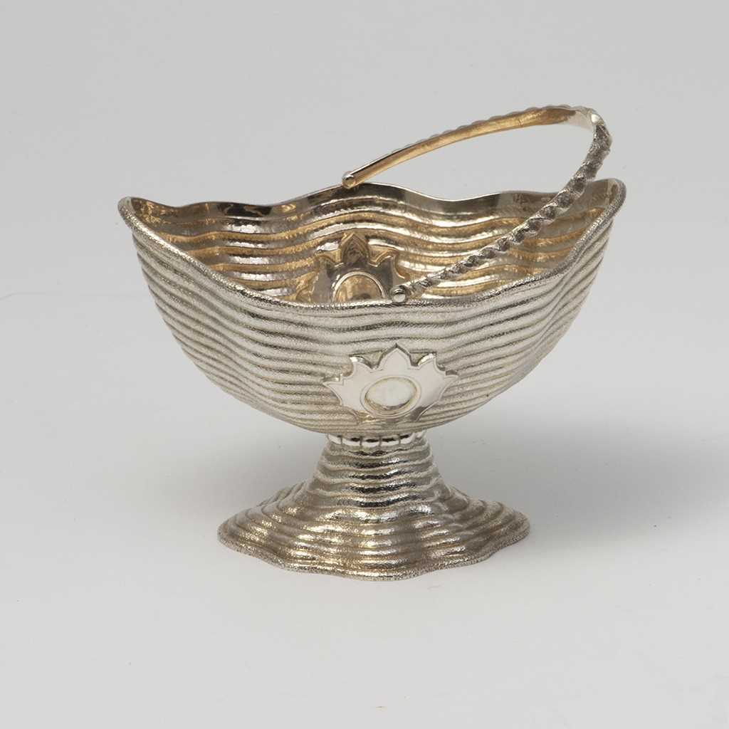 Lot 333 - A Victorian silver sugar basin, London 1873,...