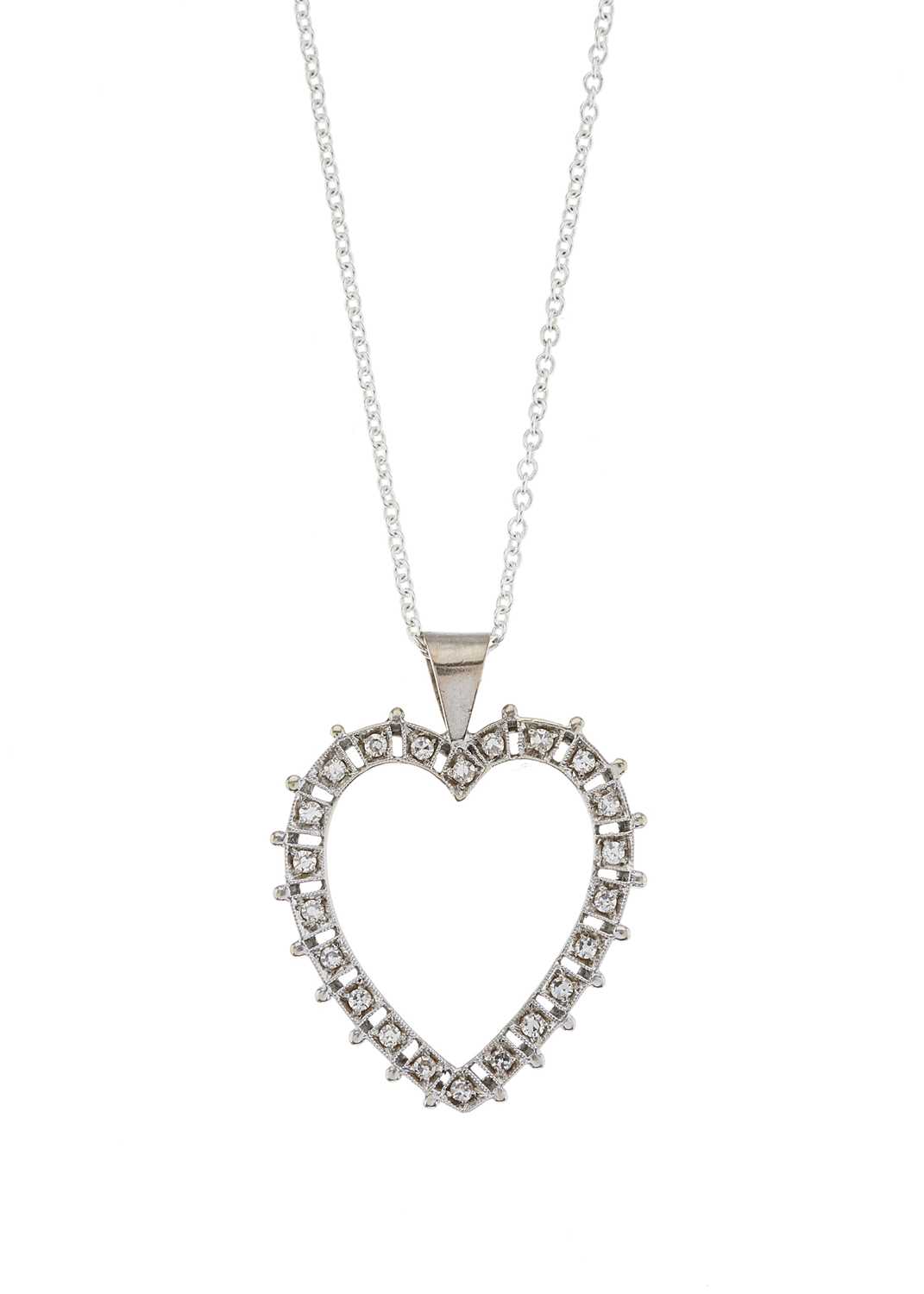 Lot 120 - A gold single-cut diamond heart-shape pendant,...