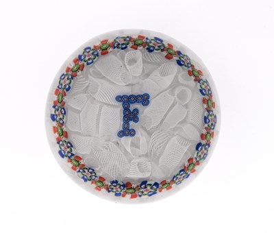 Lot 406 - A millefiori glass initial paperweight,...