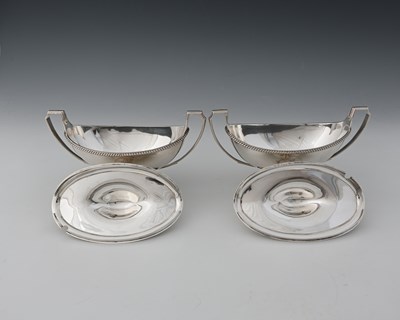 Lot 438 - Paul Storr, a pair of George III silver sauce...