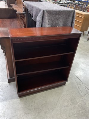 Lot 409 - A late 20th century dark wood veneered...