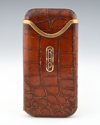 Lot 190 - Asprey, London, a George V crocodile skin...