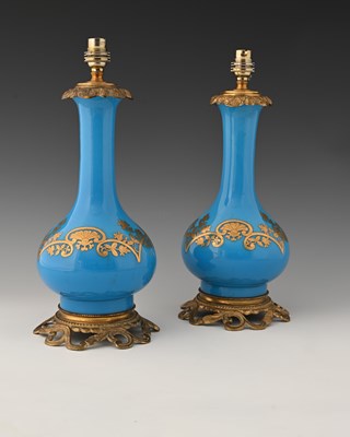 Lot 431 - A pair of French opaline glass and gilt...