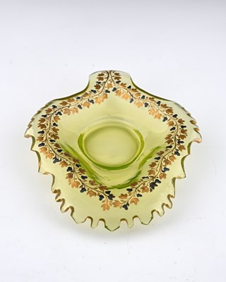 Lot 461 - A Bohemian uranium vaseline glass dish, circa...