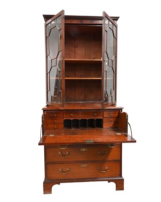 Lot 384 - A George III mahogany secretaire bookcase,...