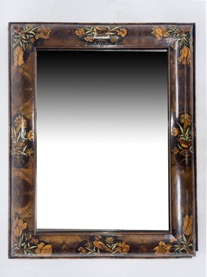 Lot 225 - A cushion framed wall mirror of William and...