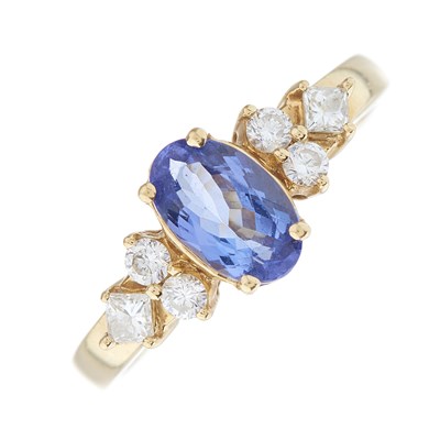 Lot 161 - An 18ct gold tanzanite dress ring, with...