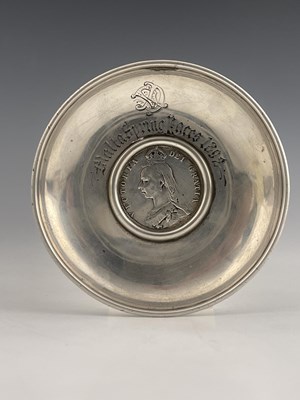 Lot 345 - A white metal bowl, inset with a half crown,...