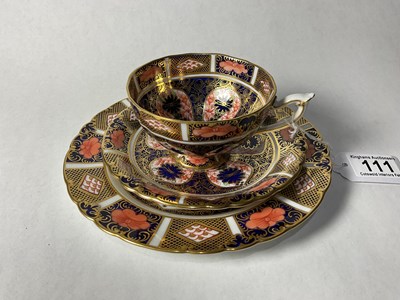 Lot 111 - A Royal Crown Derby trio of teacup, saucer and...