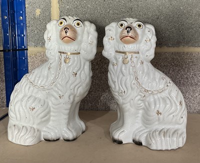 Lot 93 - A pair of Staffordshire spaniels, marked to...