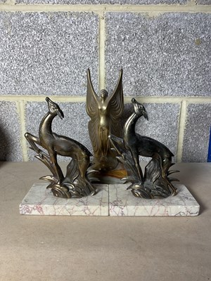 Lot 102 - Art Deco-style cast metal figurines, two...