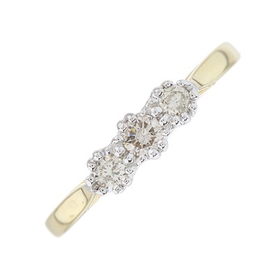 Lot 173 - An 18ct gold brilliant-cut diamond three-stone...