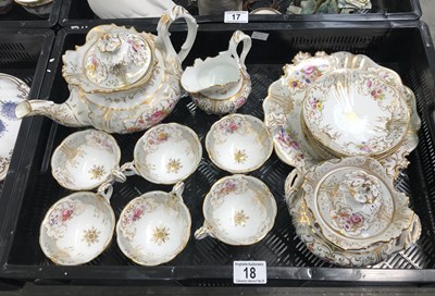 Lot 18 - A 19th century floral and gilt tea set,...