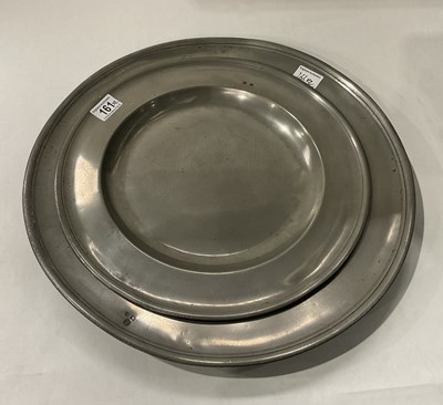 Lot 161 - A pair of Pewter chargers the larger with...