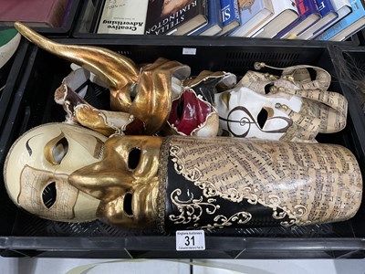 Lot 31 - A collection of Venetian style masks, some...