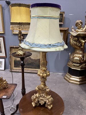 Lot 382 - A decorative gilt plaster electric torchere,...