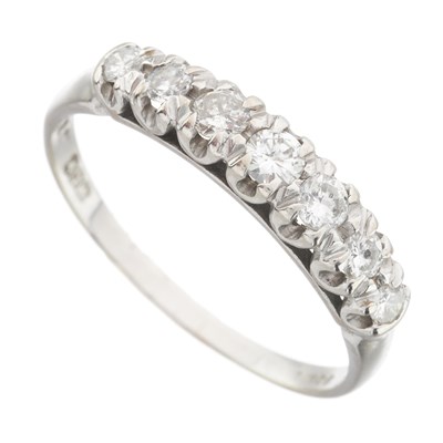 Lot 48 - An 18ct gold diamond half eternity ring