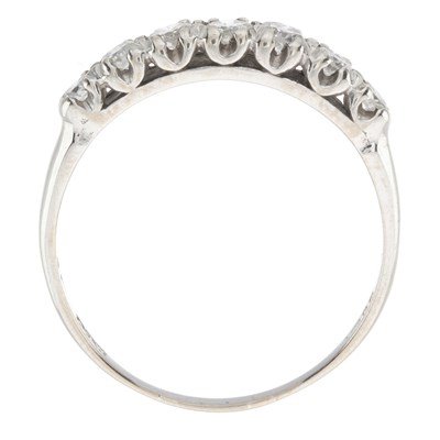 Lot 48 - An 18ct gold diamond half eternity ring