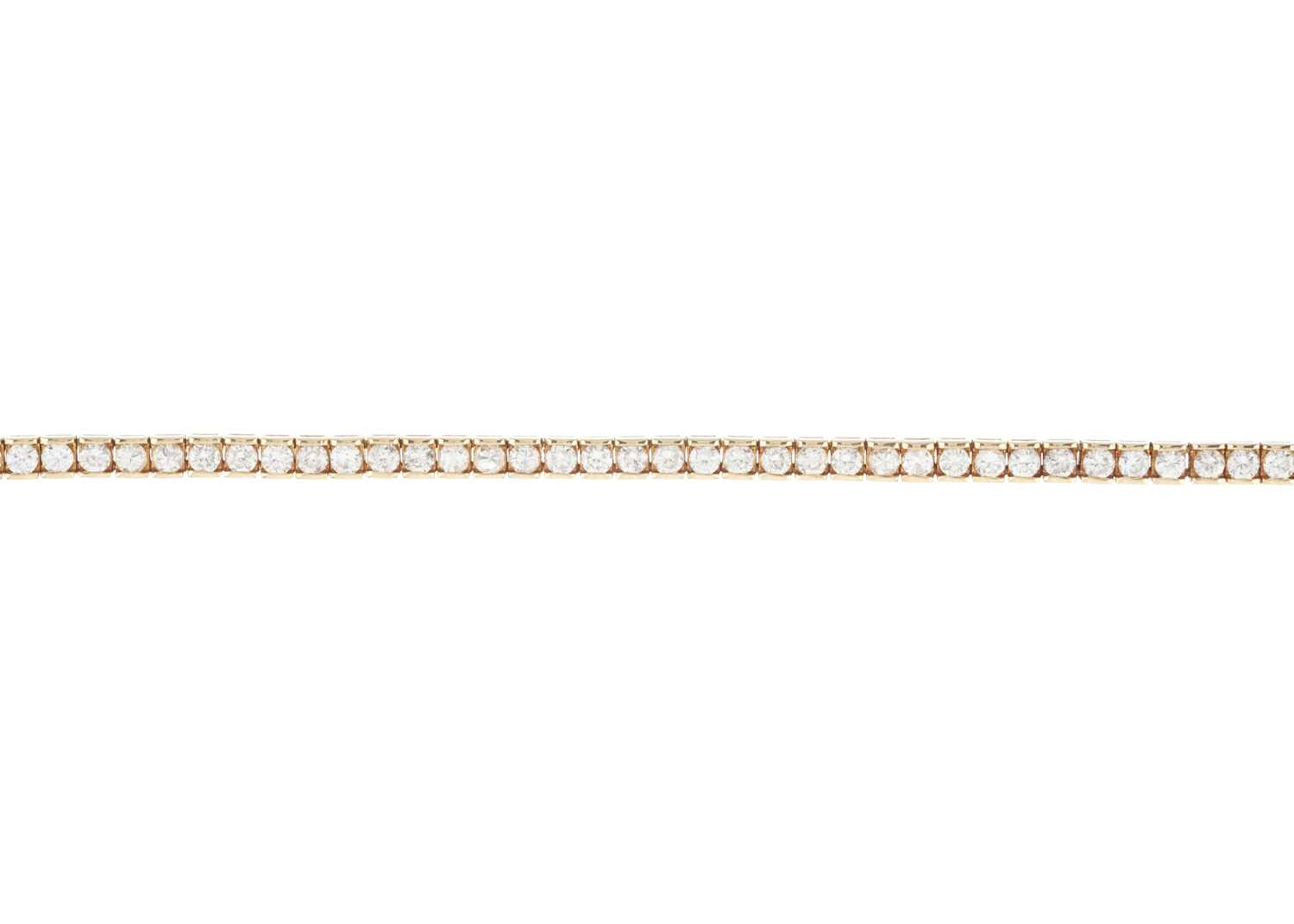 Lot 152 - An 18ct gold diamond line bracelet